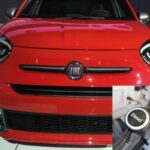 Auto con logo FIAT e nel riquadro un distributore diesel