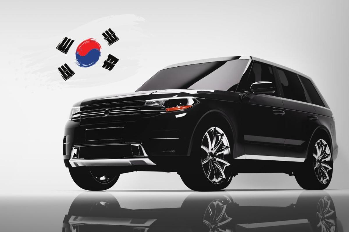 Un SUV nero e una bandiera coreana