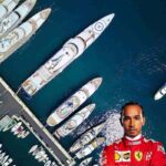 Degli yacht ormeggiati al porto e un primo piano di Hamilton