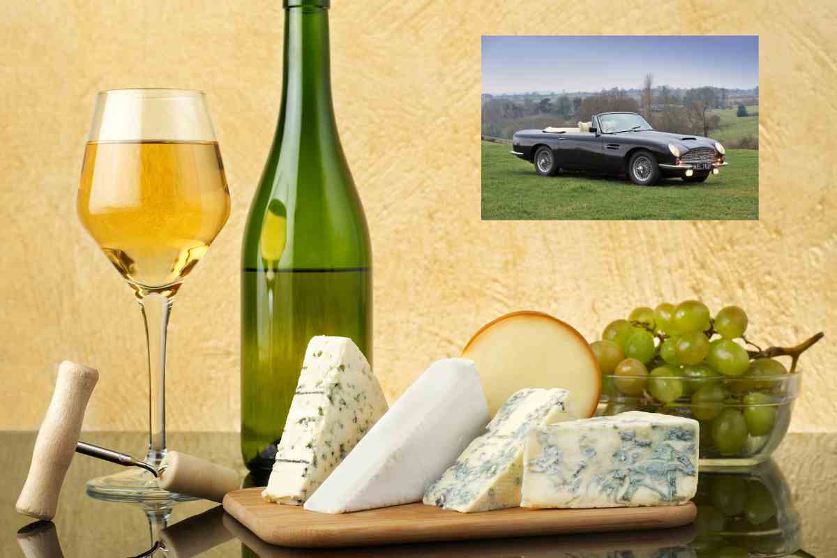 L'Aston Martin di Re Carlo assieme a vino bianco e formaggio